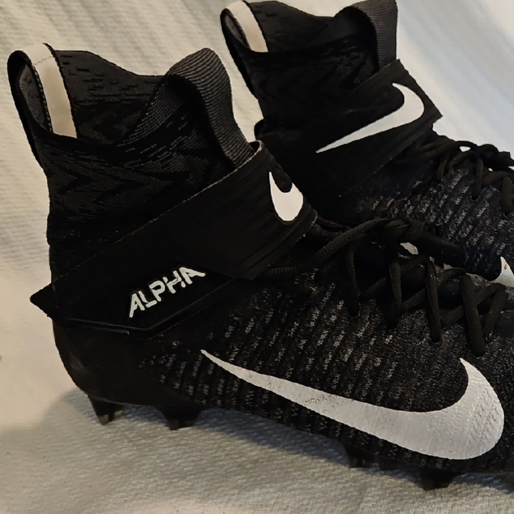 Nike Alpha Black and White Sports Cleats